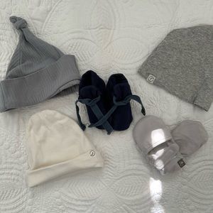 Newborn hats, bootie, and hand covering.